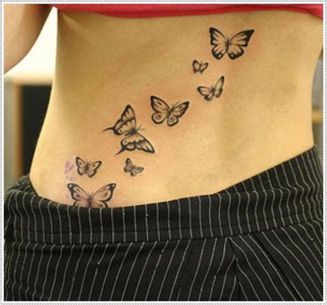 Tatuajes femeninos de mariposas en la espalda